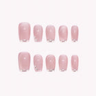 Juliet’s Velvet Rose: glossy pink square press-on nails with silver-tone tip accents, set arranged on a pale background.