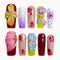 Carnival Bloom Reverie press-on nails in red, green, pink, yellow, purple, blue, nude, and white with 3D flowers, polka dots, and glossy details