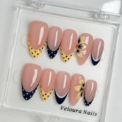 Midnight Bow Dots press-on nails in Nude, Black, Yellow, detail view 1