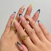 Midnight Bow Dots press-on nails in Nude, Black, Yellow, detail view 4