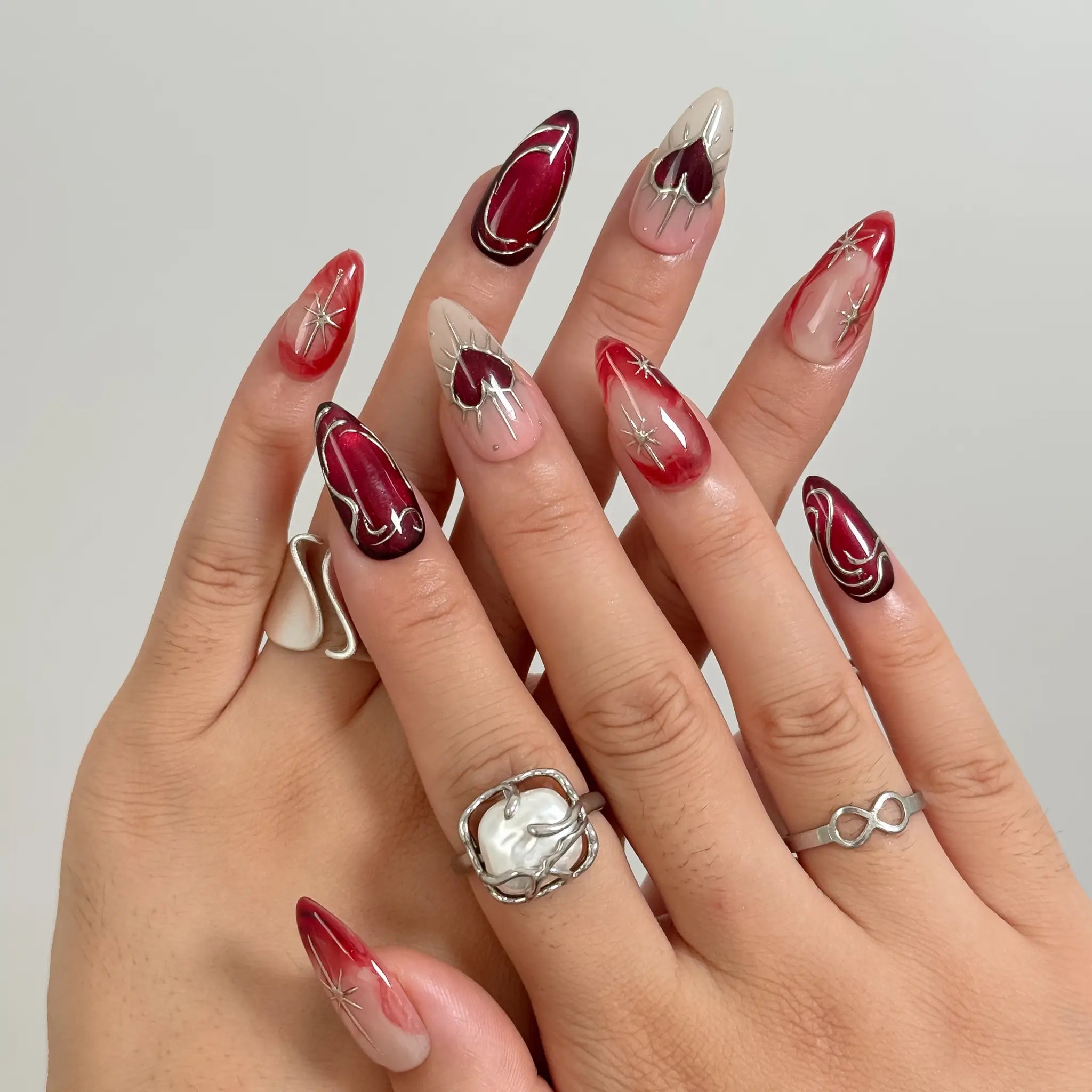 Scarlet Heart Orbit press-on nails in Red, Nude, Silver, detail view 5