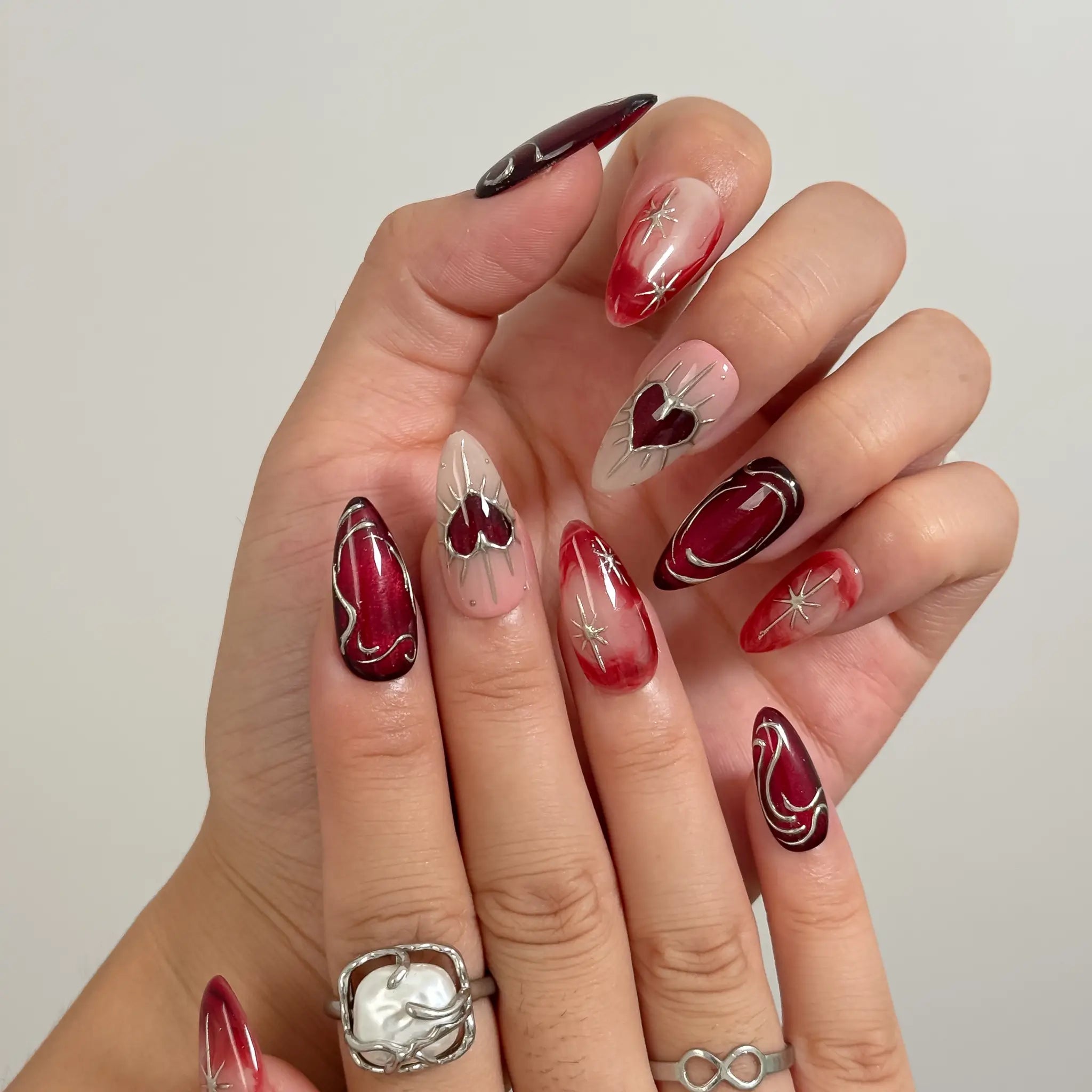 Scarlet Heart Orbit press-on nails in Red, Nude, Silver, detail view 4