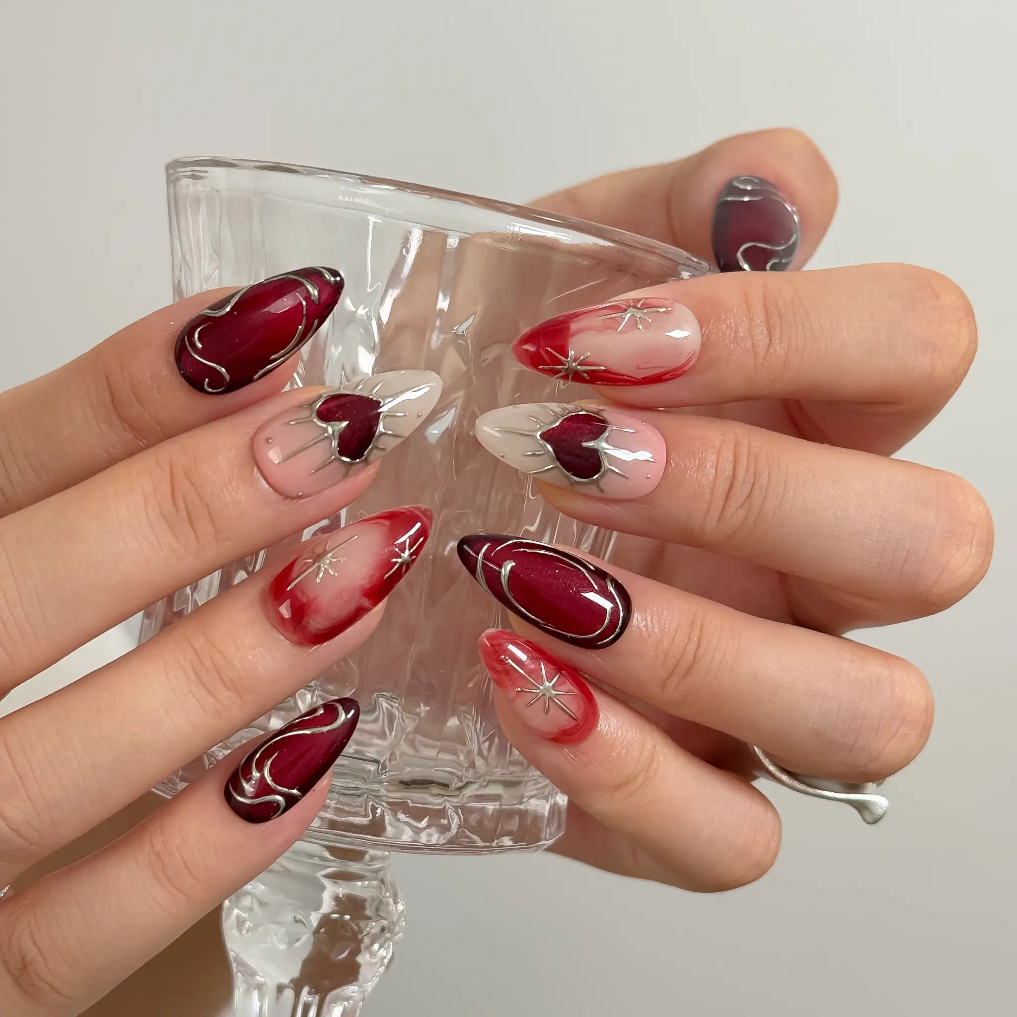Scarlet Heart Orbit press-on nails in Red, Nude, Silver, detail view 2