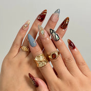 Opal Ember Orbit press-on nails in Nude, Red, Blue, Gold, detail view 4