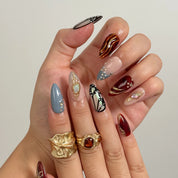 Opal Ember Orbit press-on nails in Nude, Red, Blue, Gold, detail view 3