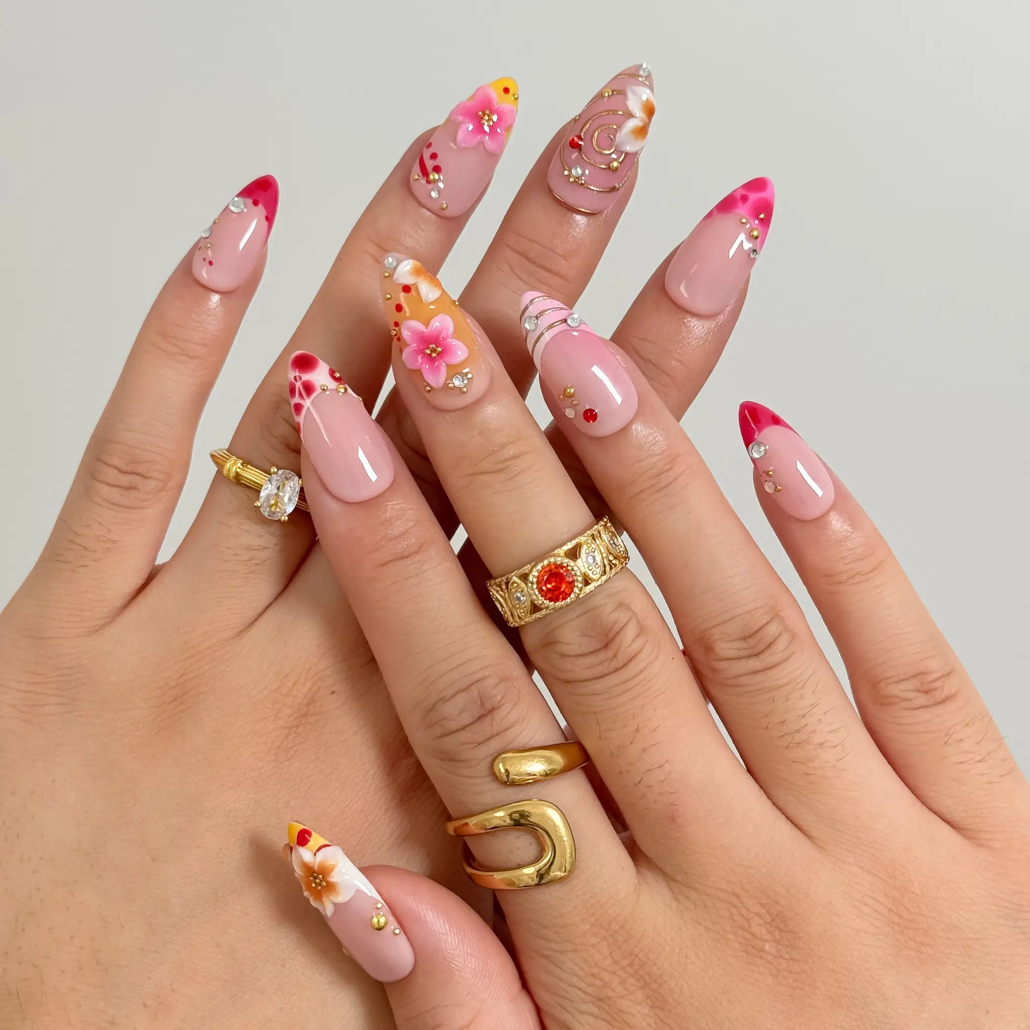 Sunset Petal Carnival press-on nails in Pink, Orange, Red, Gold, detail view 2