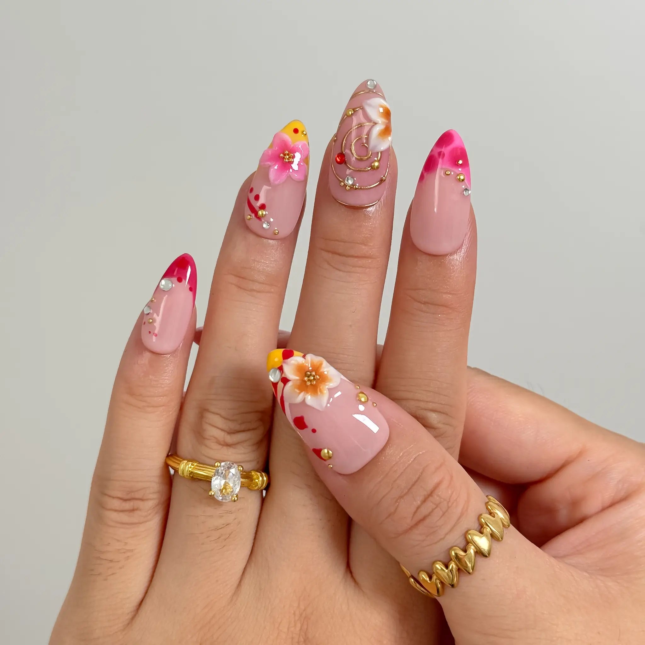 Sunset Petal Carnival press-on nails in Pink, Orange, Red, Gold, detail view 3