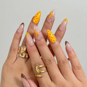Amber Dot Whimsy press-on nails in Nude, Orange, Brown, detail view 1