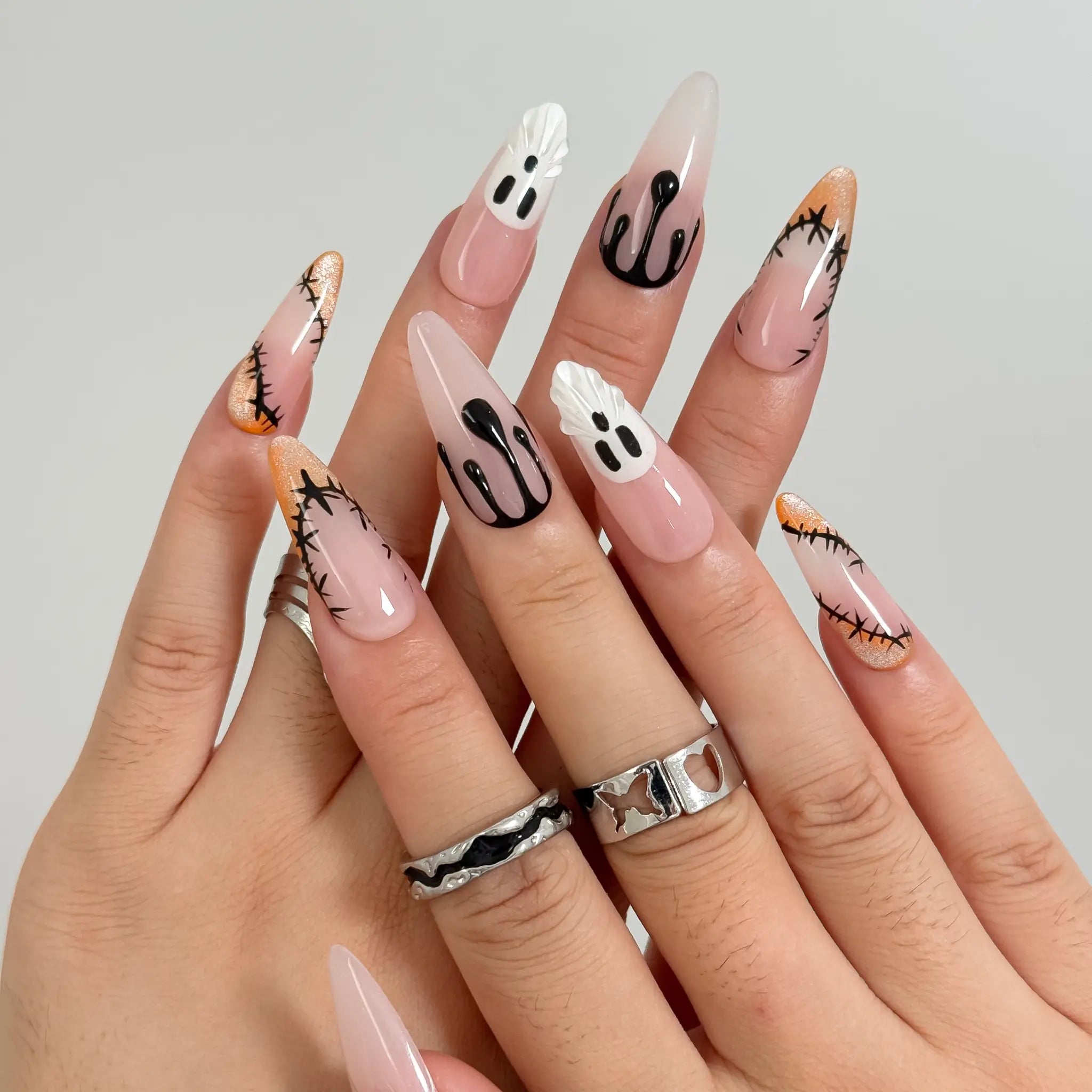 Spooky Stitch Specter press-on nails in Nude, Black, Orange, White, detail view 3