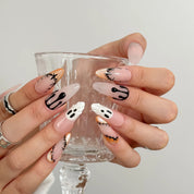 Spooky Stitch Specter press-on nails in Nude, Black, Orange, White, detail view 1