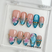 Lagoon Petal Treasure press-on nails in Blue, Pink, Gold, Nude, detail view 4