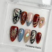 Opal Ember Orbit press-on nails in Nude, Red, Blue, Gold, detail view 1