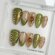 Olive Celestial Relic press-on nails in Green, Gold, Nude, detail view 1