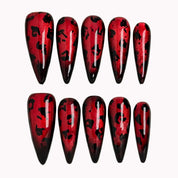 Crimson Panther Eclipse press-on nails in Red, Black on a white background