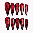 Crimson Panther Eclipse press-on nails in Red, Black on a white background