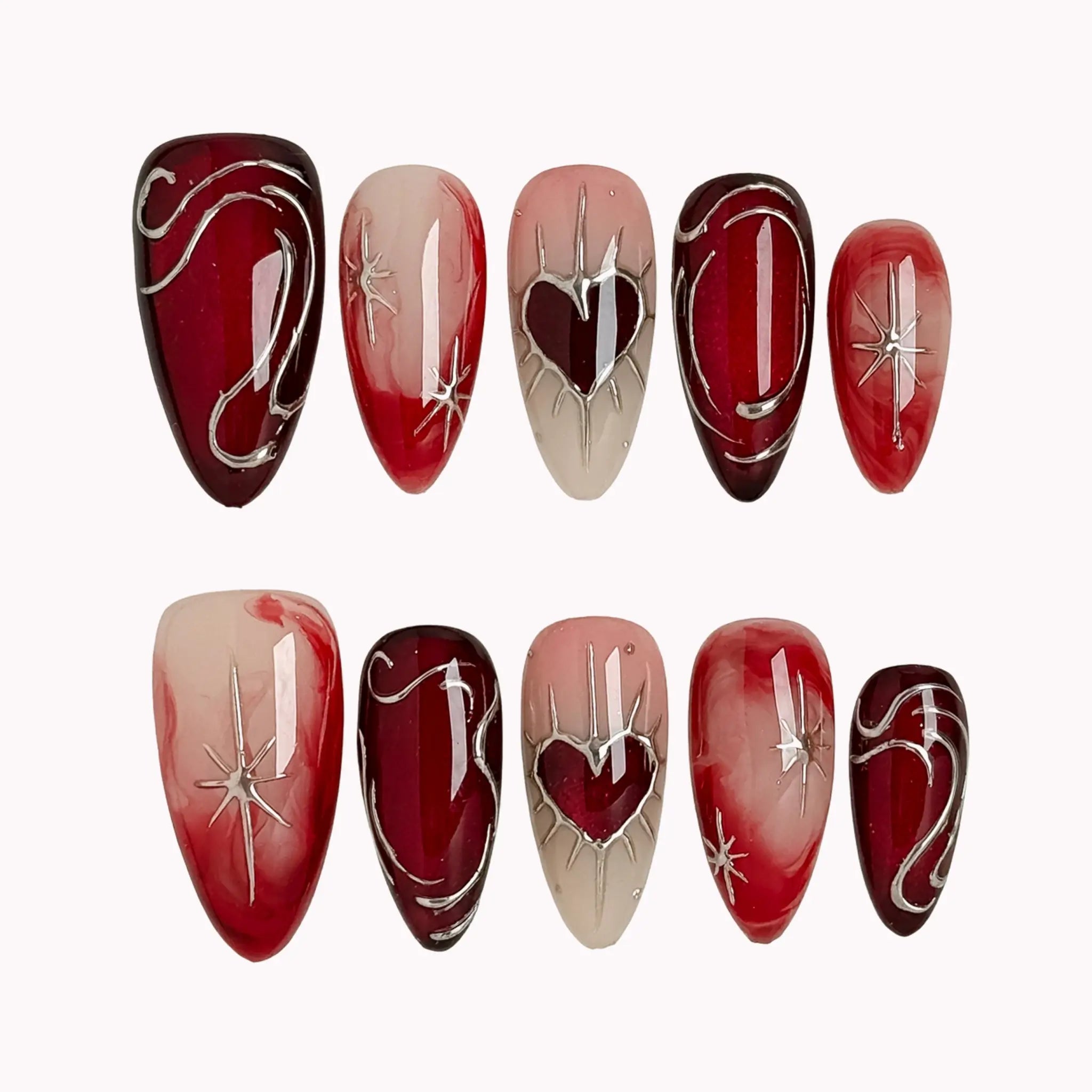 Scarlet Heart Orbit press-on nails in Red, Nude, Silver on a white background