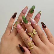 Monarch Meadow Magic Long Almond press-on nails, modeled detail view 1