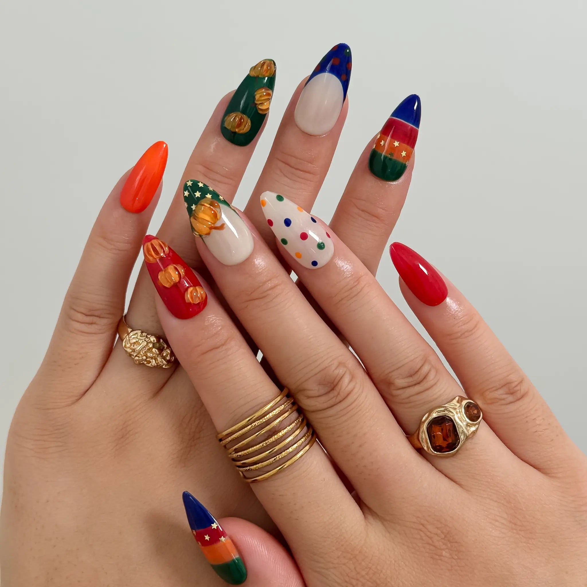 Pumpkin Parade Pop Long Almond press-on nails, modeled detail view 1