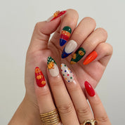 Pumpkin Parade Pop Long Almond press-on nails, modeled detail view 2