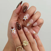 Mocha Blossom Lace Long Almond press-on nails, modeled detail view 2