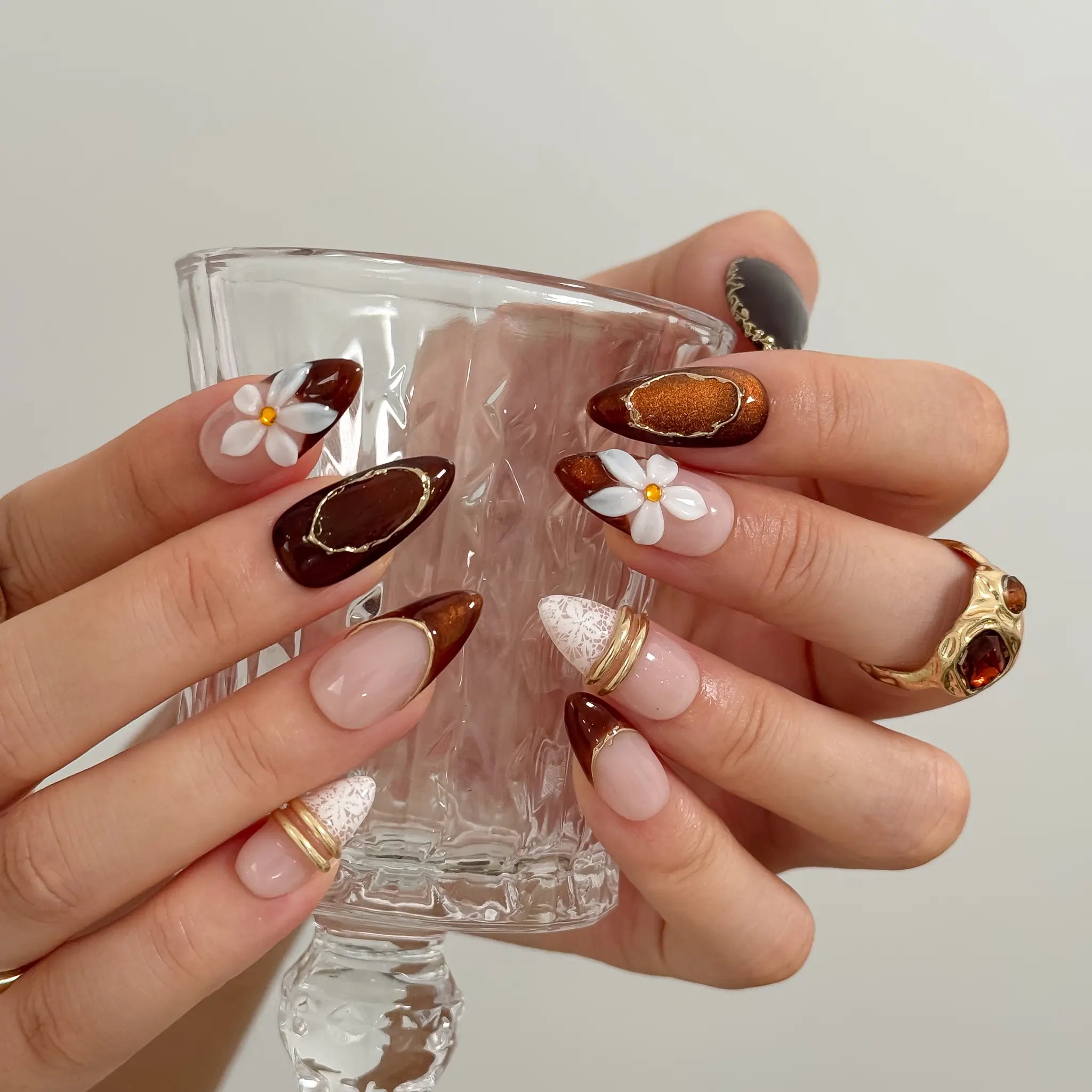 Mocha Blossom Lace Long Almond press-on nails, modeled detail view 3