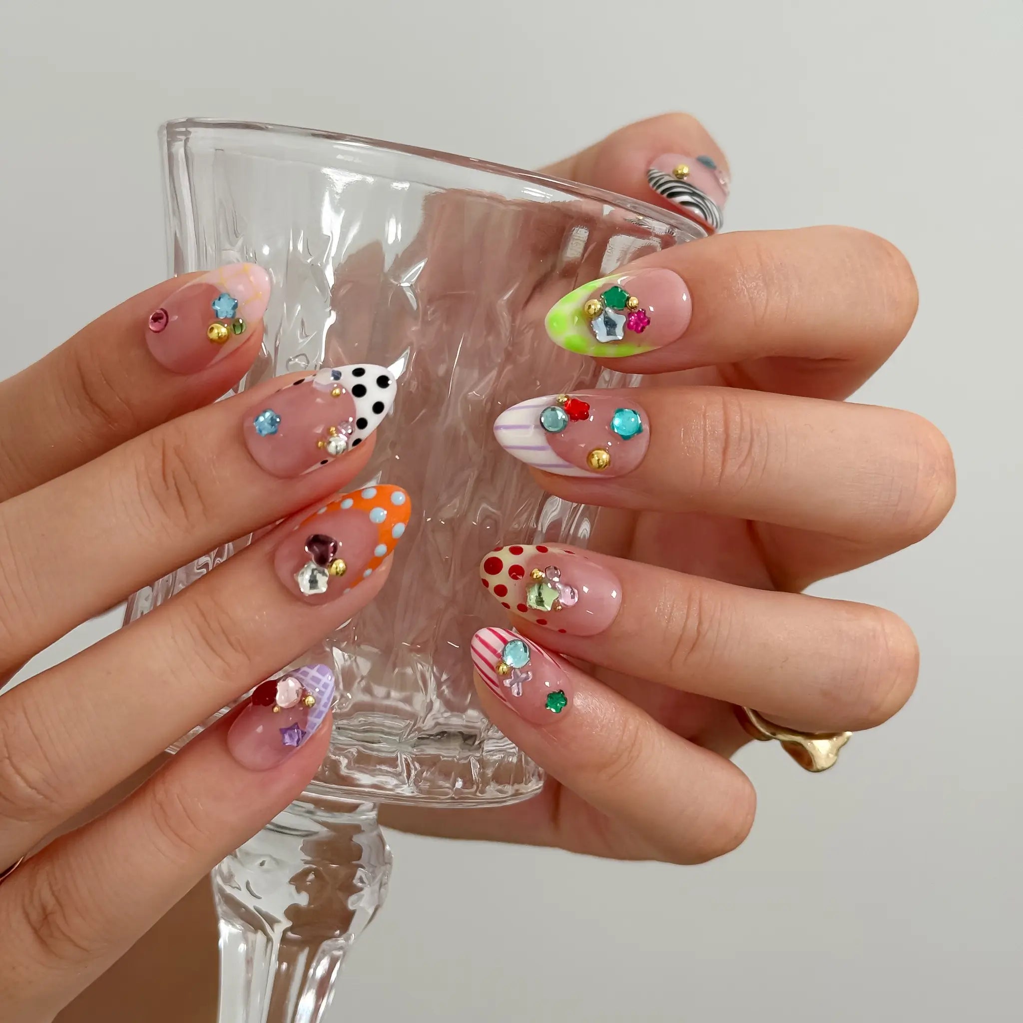 Candy Gem Parade Long Almond press-on nails, modeled detail view 4