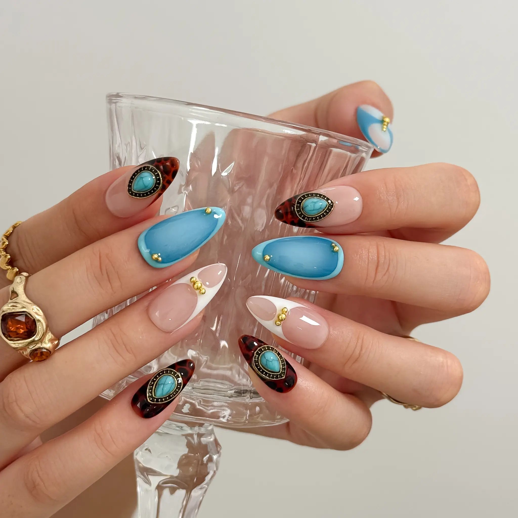 Turquoise Talisman Long Almond press-on nails, modeled detail view 3