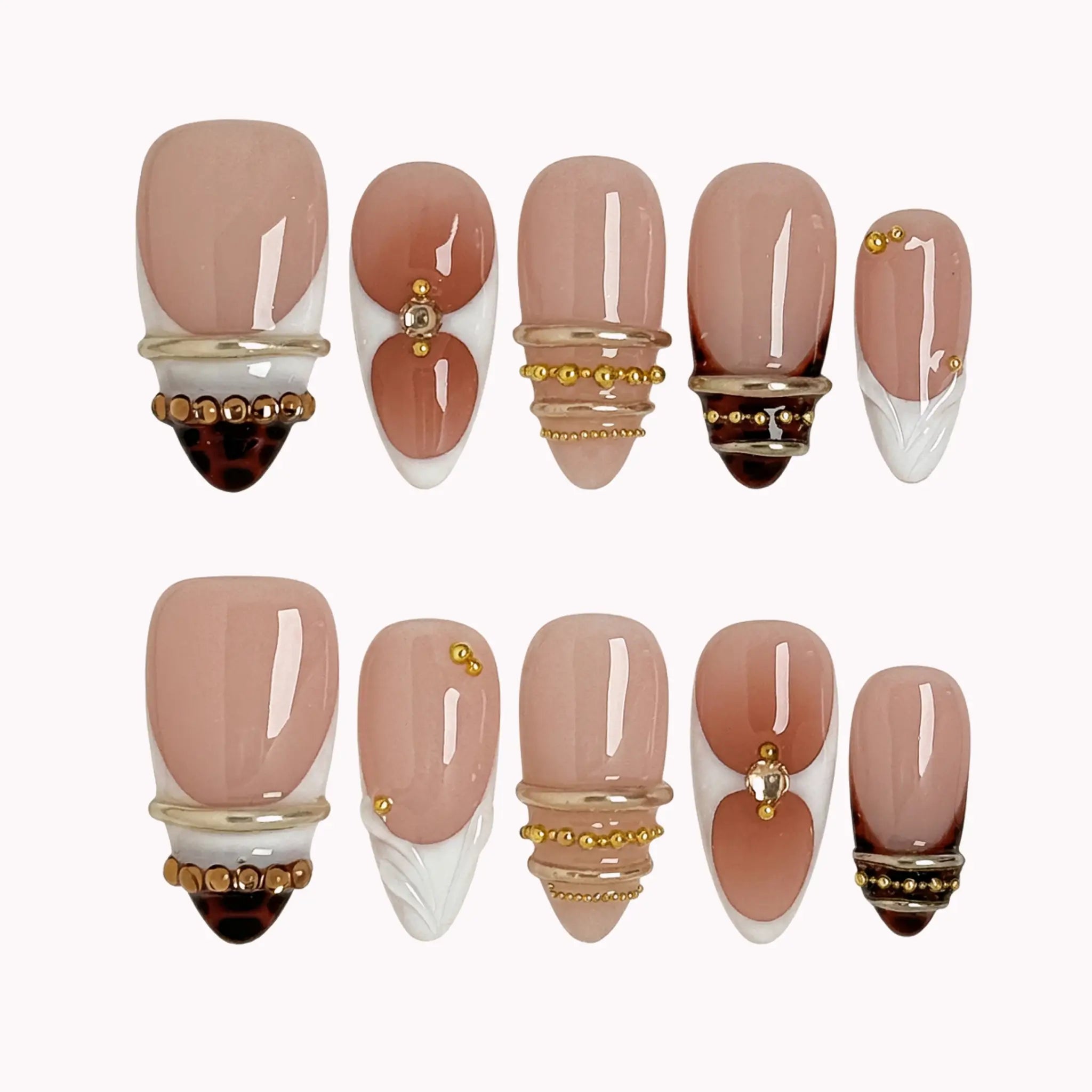 Gilded Tortoise Frame press-on nails in Nude, White, Brown, Gold on a white background