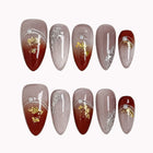 Burgundy Foil Reverie press-on nails in Red, Silver, Gold, Nude on a white background