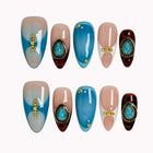 Turquoise Talisman press-on nails in Blue, Brown, Black, Gold, Nude, White on a white background