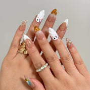 Amber Ghost Lantern Long Almond press-on nails, modeled detail view 1
