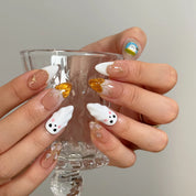 Amber Ghost Lantern Long Almond press-on nails, modeled detail view 3