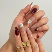 Tortoise Ribbon Reverie Long Stiletto press-on nails, modeled detail view 1
