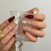 Tortoise Ribbon Reverie Long Stiletto press-on nails, modeled detail view 2