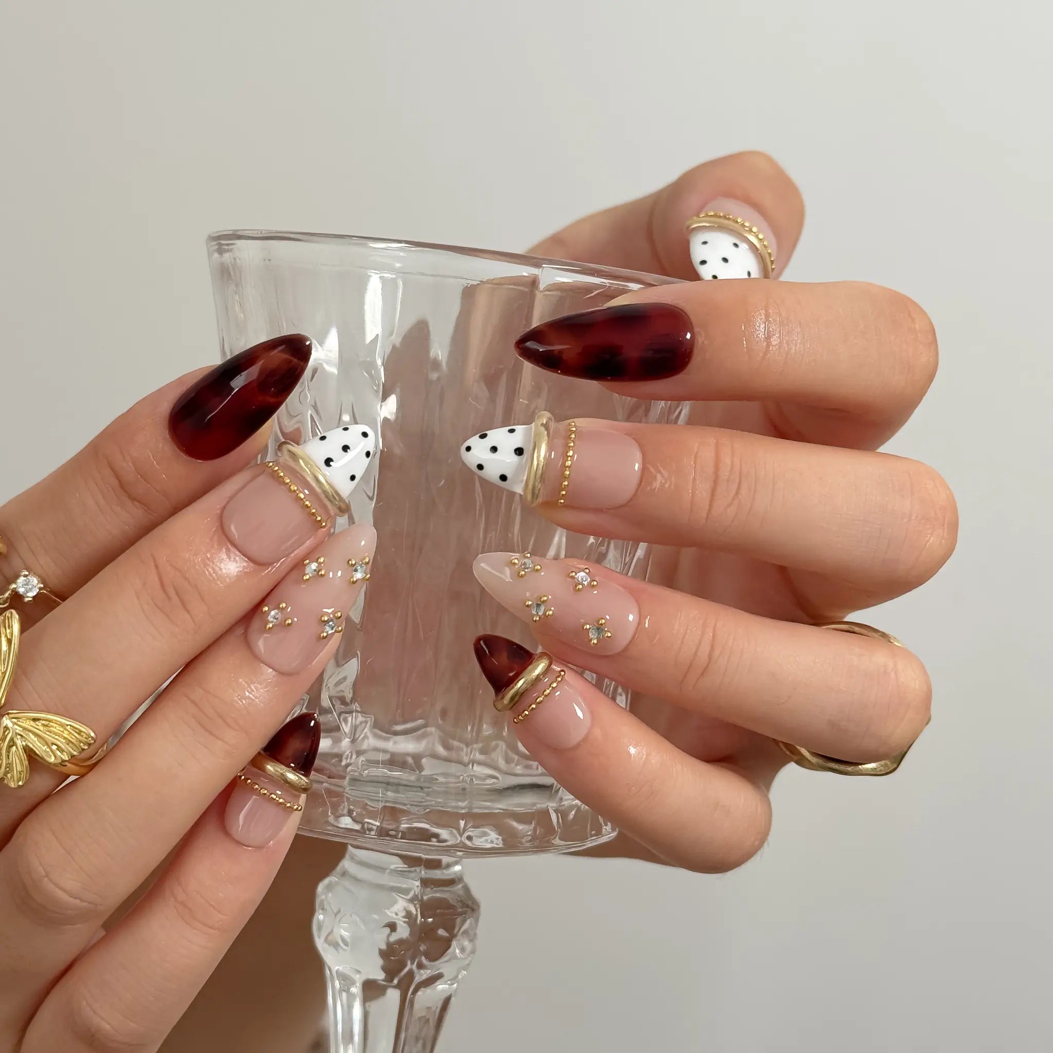 Tortoise Ribbon Reverie Long Stiletto press-on nails, modeled detail view 2