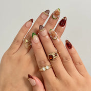 Orchard Truffle Bloom Long Almond press-on nails, modeled detail view 1
