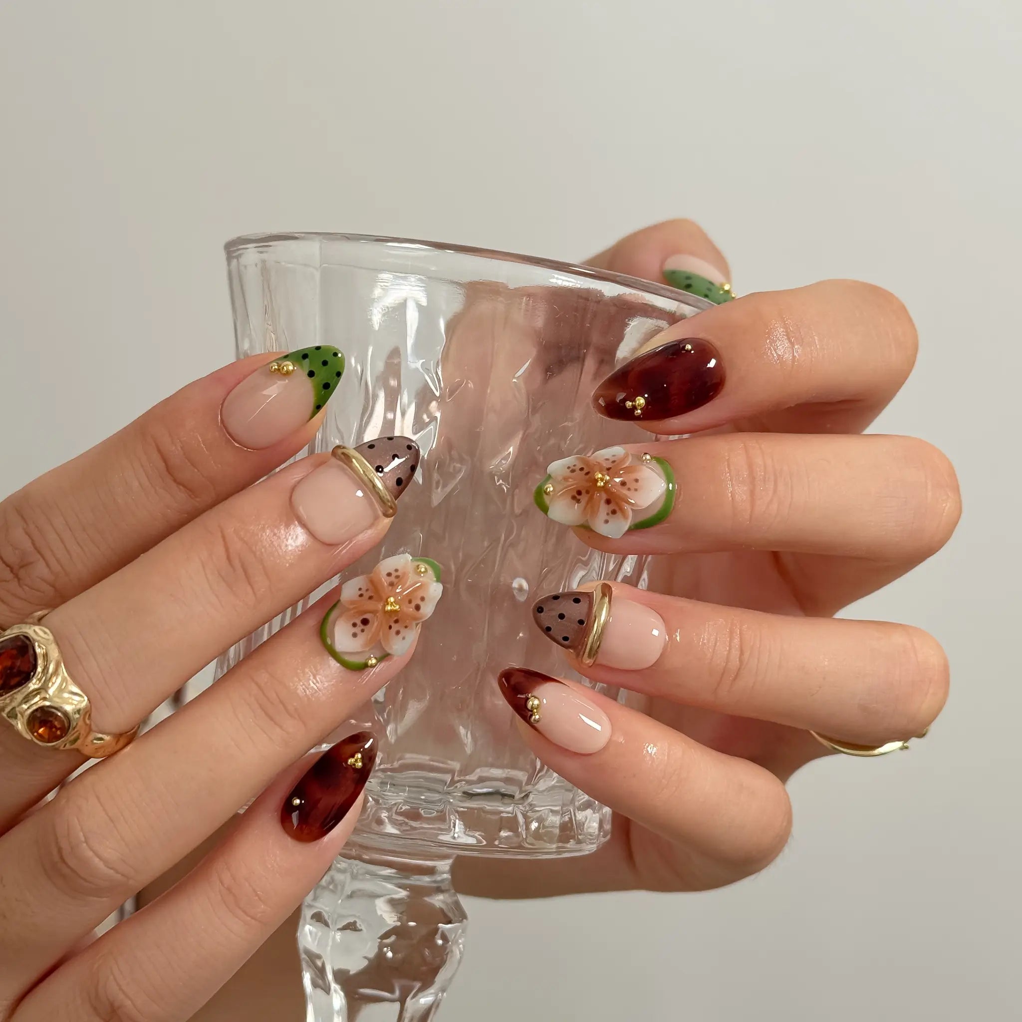 Orchard Truffle Bloom Long Almond press-on nails, modeled detail view 2