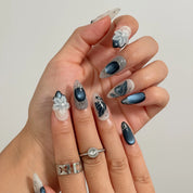 Midnight Petal Sonata Long Almond press-on nails, modeled detail view 2