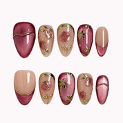 Rosewood Garden Glow press-on nails in Pink, Nude, Gold on a white background