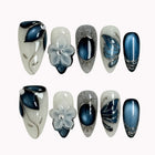 Midnight Petal Sonata press-on nails in Blue, White, Silver on a white background