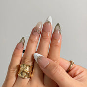 Pearl Star Bow Long Almond press-on nails, modeled detail view 2