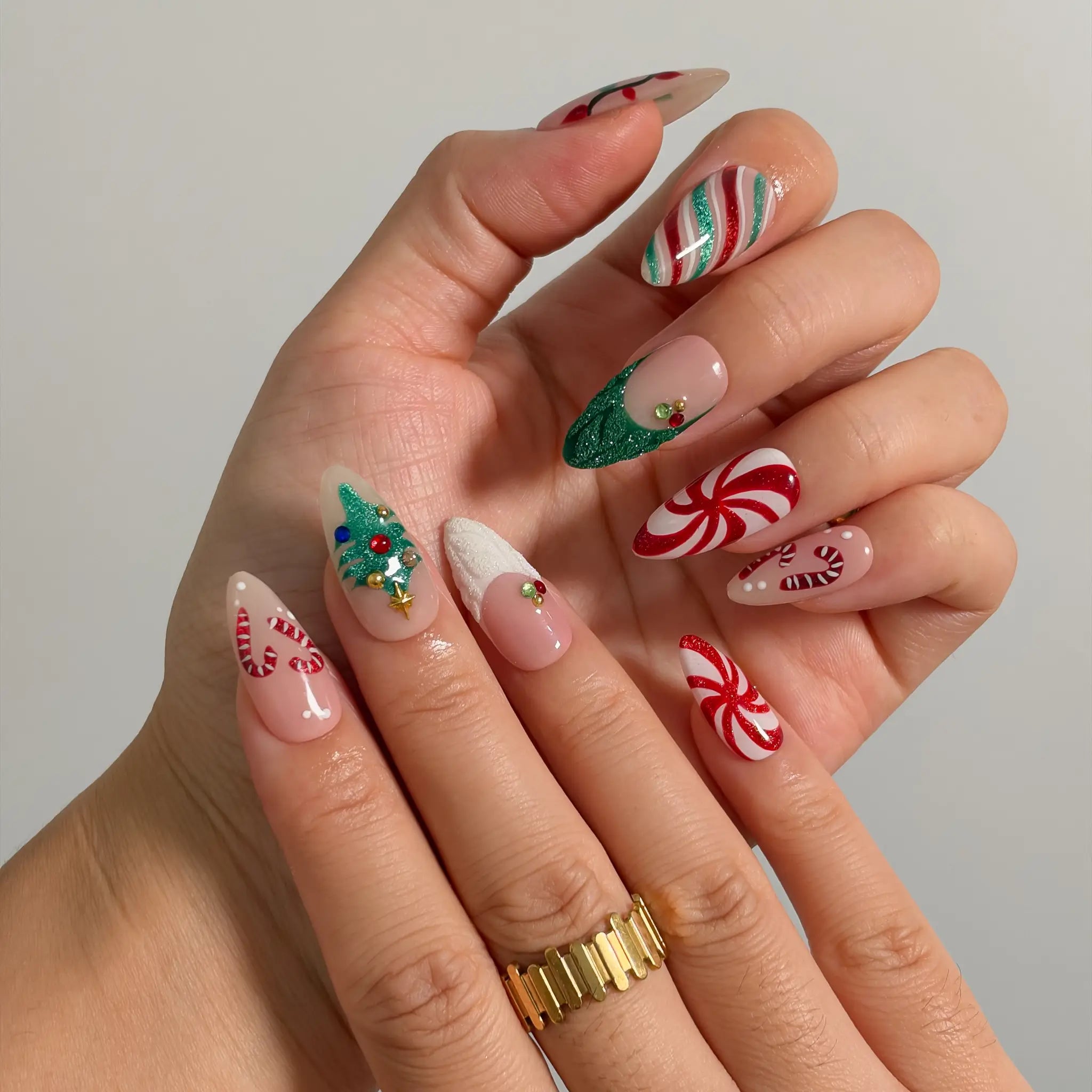 Peppermint Tree Parade Long Almond press-on nails, modeled detail view 1