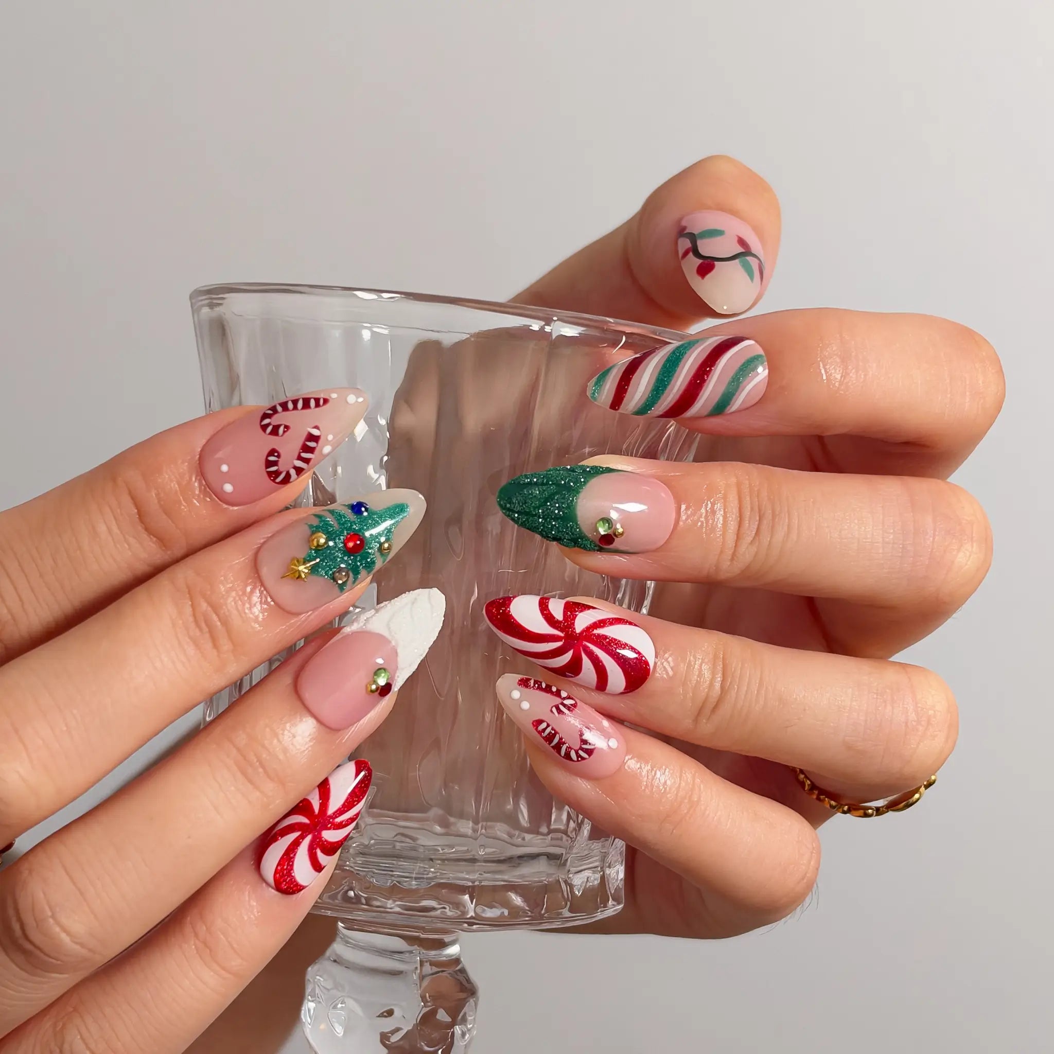 Peppermint Tree Parade Long Almond press-on nails, modeled detail view 2