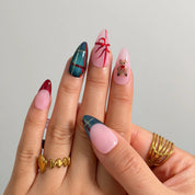 Teddy Gift Gala Long Almond press-on nails, modeled detail view 2