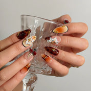 Amber Botanical Heirloom Long Almond press-on nails, modeled detail view 3