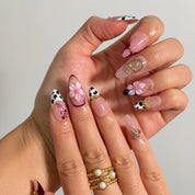 Burgundy Wildflower Muse Long Almond press-on nails, modeled detail view 1