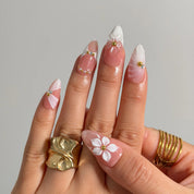 Ivory Petal Reverie Long Almond press-on nails, modeled detail view 2