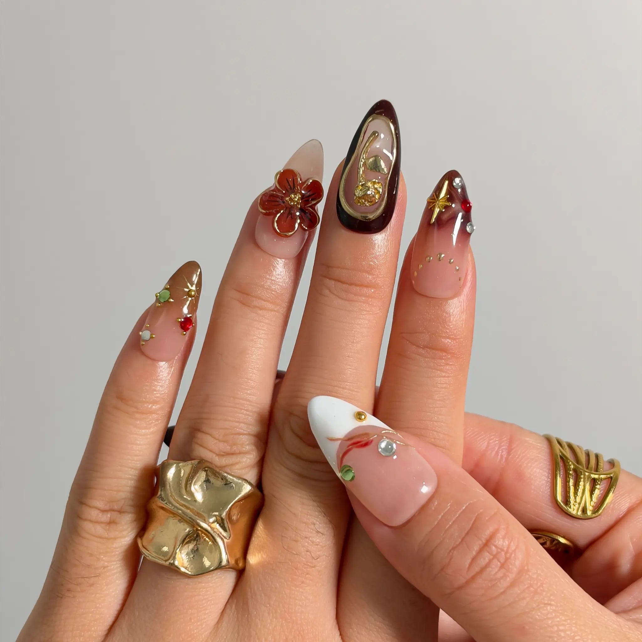Mocha Gilded Relic Long Almond press-on nails, modeled detail view 2