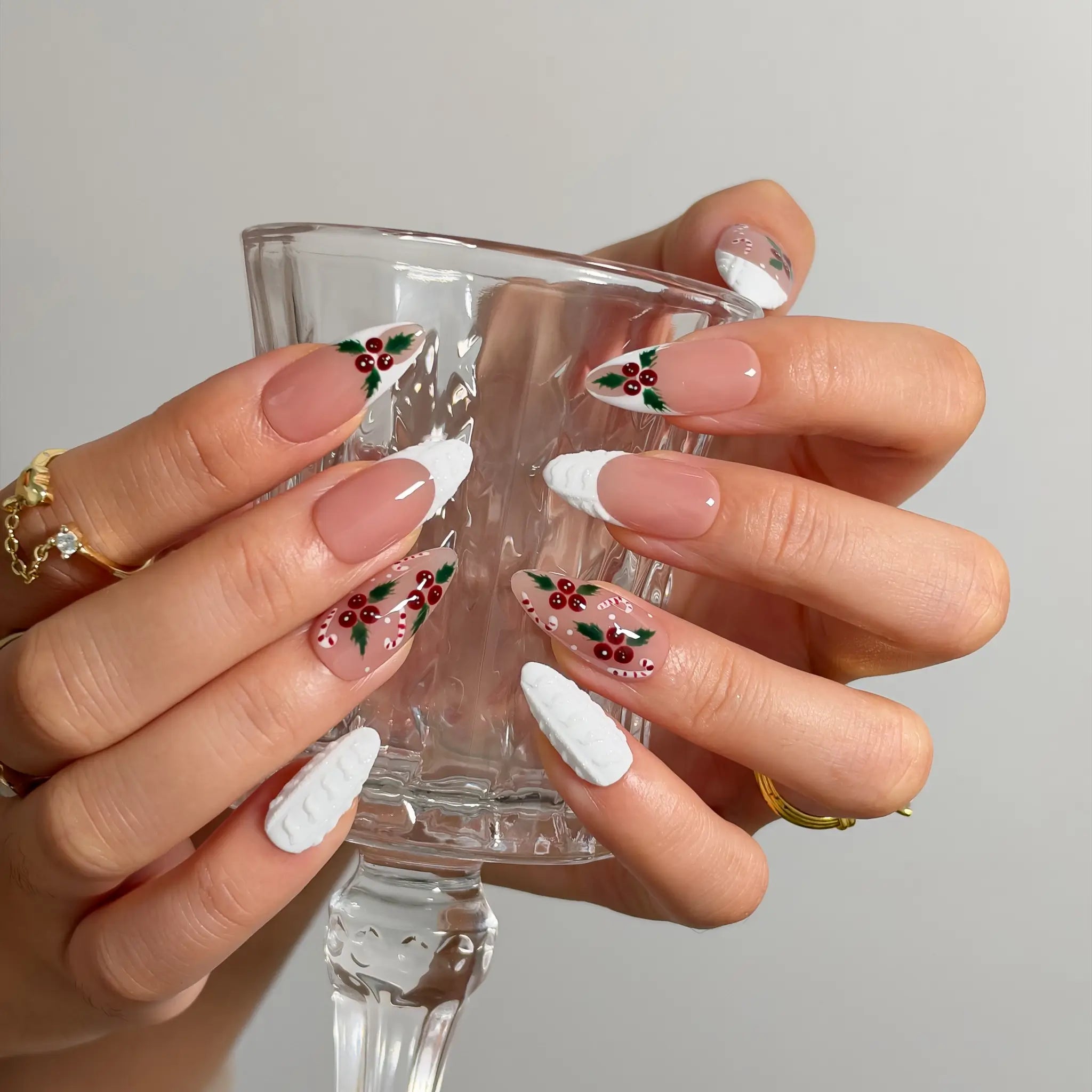 Candy Cane Snow Kiss Long Almond press-on nails, modeled detail view 2