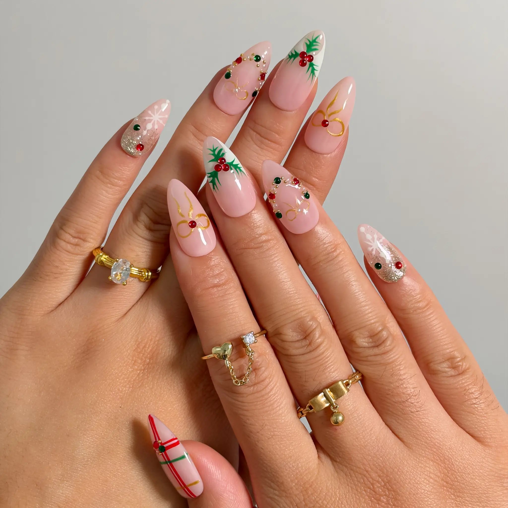 Yuletide Plaid Charm press-on nails shown on hand